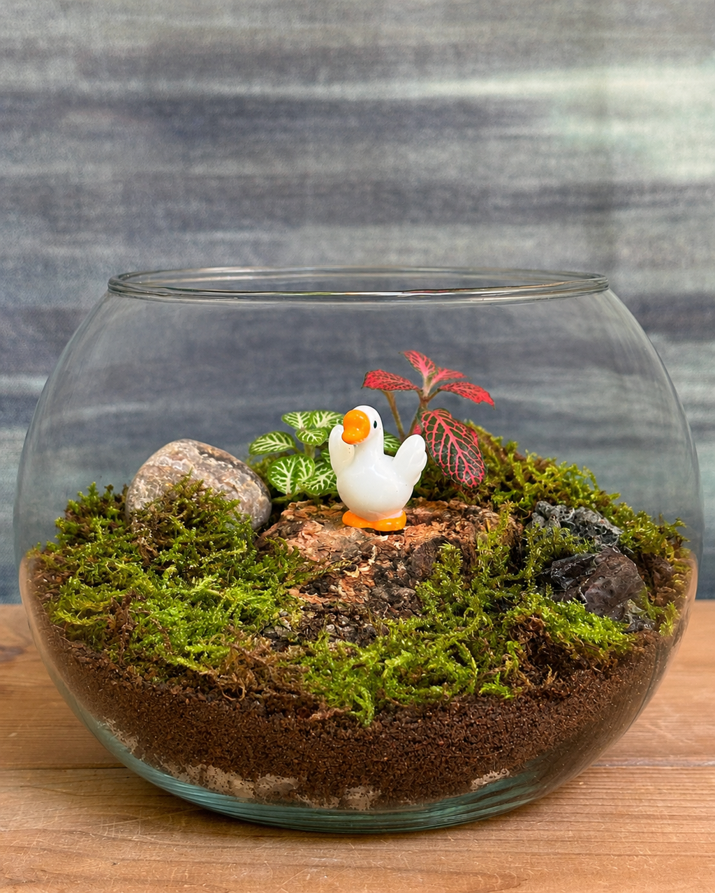 Baby Swan Terrarium with graceful baby swan figurine from Planterie, perfect for plant styling ideas for small Delhi apartments, centre table plant arrangement in Delhi and minimal plant arrangements for modern homes, with how to keep indoor plants alive in India and how to care for terrarium in Indian weather with Plant care tips India